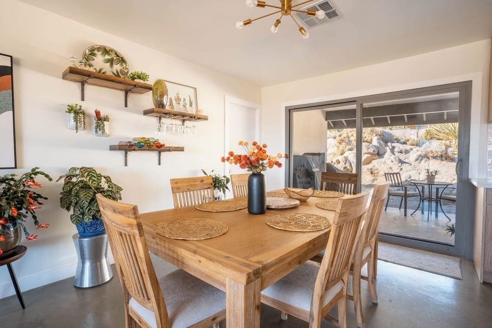 Dining room exit to covered back patio and BBQ