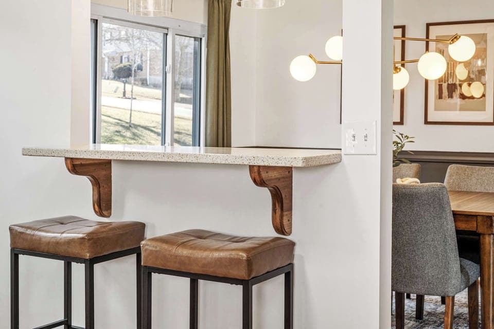 Kitchen breakfast bar w/ seating for casual bites