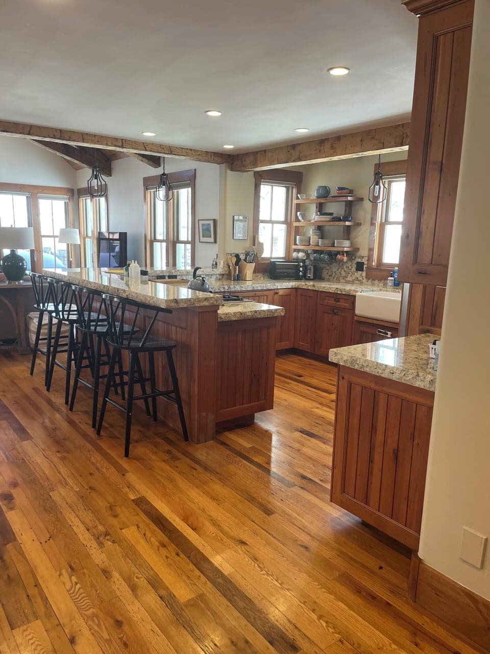 Fully equipped kitchen with modern appliances and ample counter space  