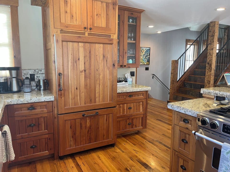 Fully equipped kitchen with modern appliances and ample counter space  