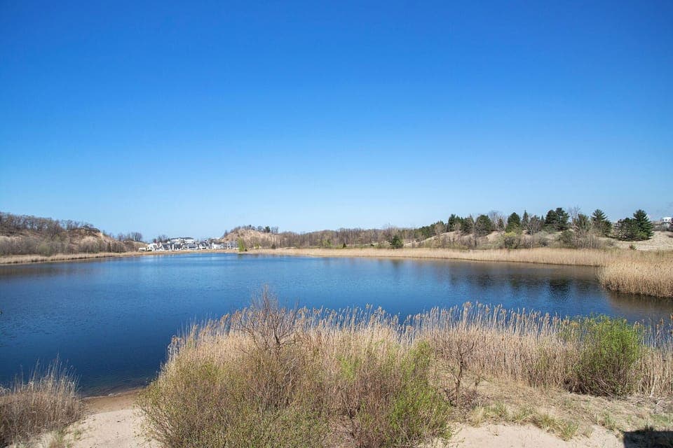Coffee in hand, toes in the sand, and the beach at your doorstep.