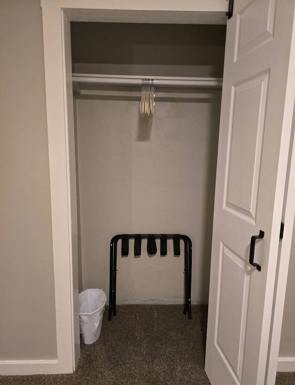 Closet with bi-fold barn door