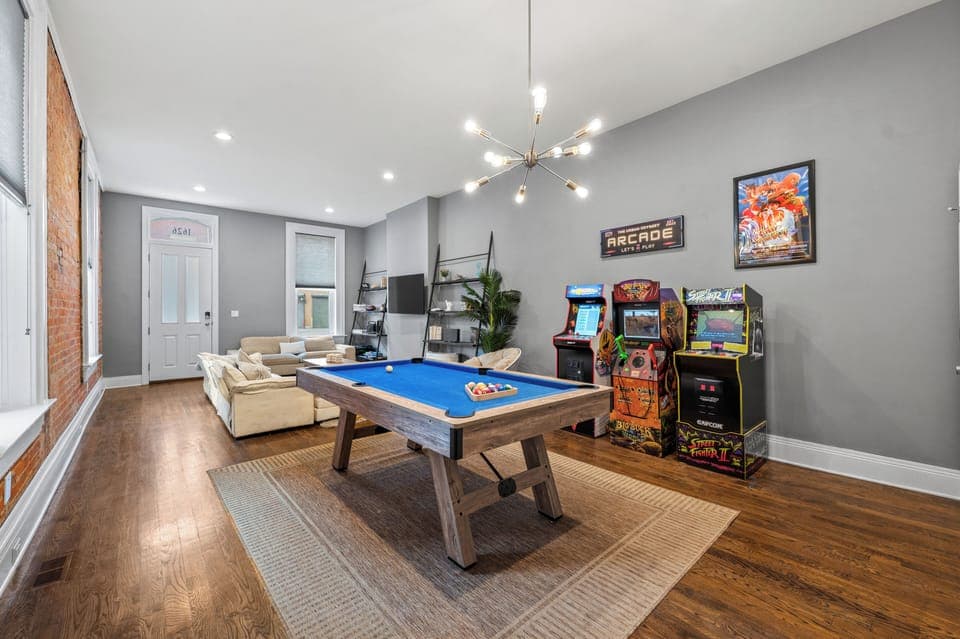 Enjoy a full sized pool table, classic arcade games, and cozy lounge area.