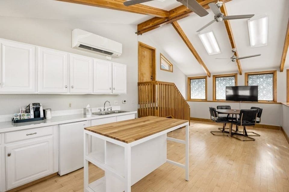Prep snacks easily with generous counters and bright natural light.