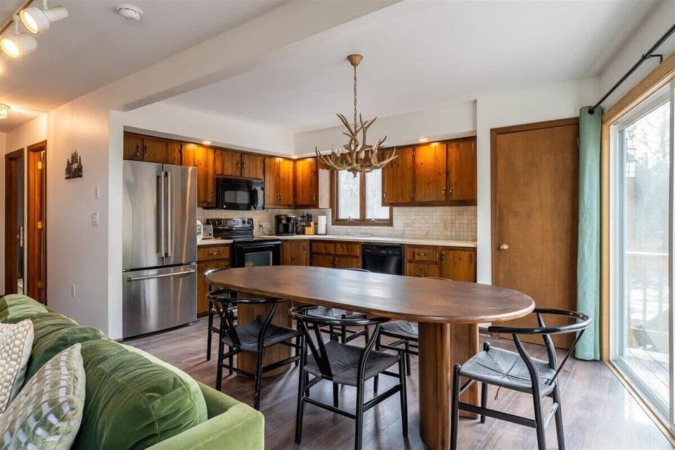 Dining Room: Gather around the unique wood table and savor home-cooked meals in style!
