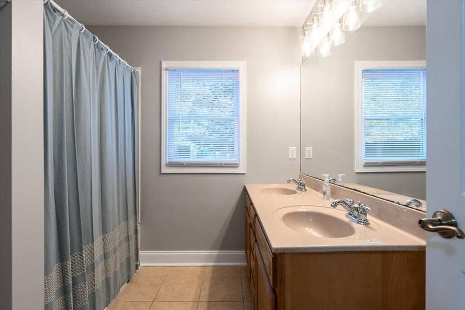 Full bathroom with tub