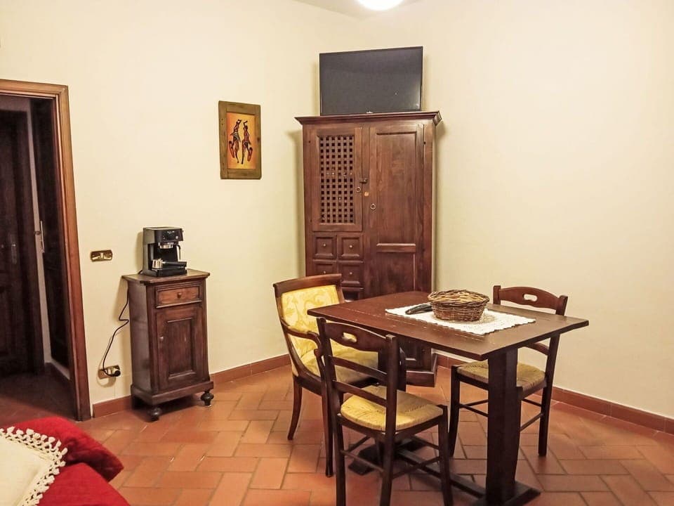 Furniture, Flooring, Wood, Interior Design, Floor, Table, Room, Picture Frame, Lighting, Brown