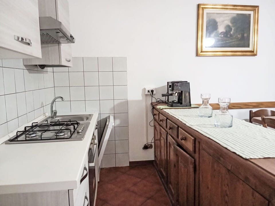 Flooring, Kitchen, Wood, Countertop, Furniture, Interior Design, Major Appliance, Cabinetry, Floor, Kitchen Appliance