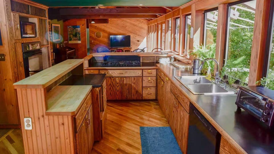 Fully stocked kitchen.  Cabinets are all labeled to make it effortless to find t