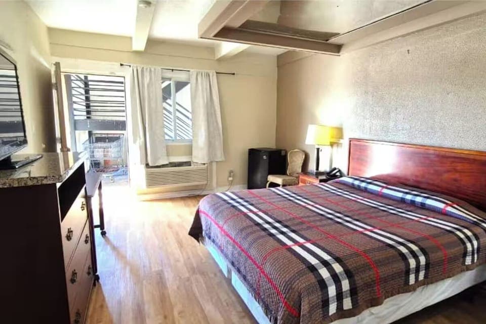 Step into a bright, spacious room made for restful nights.
