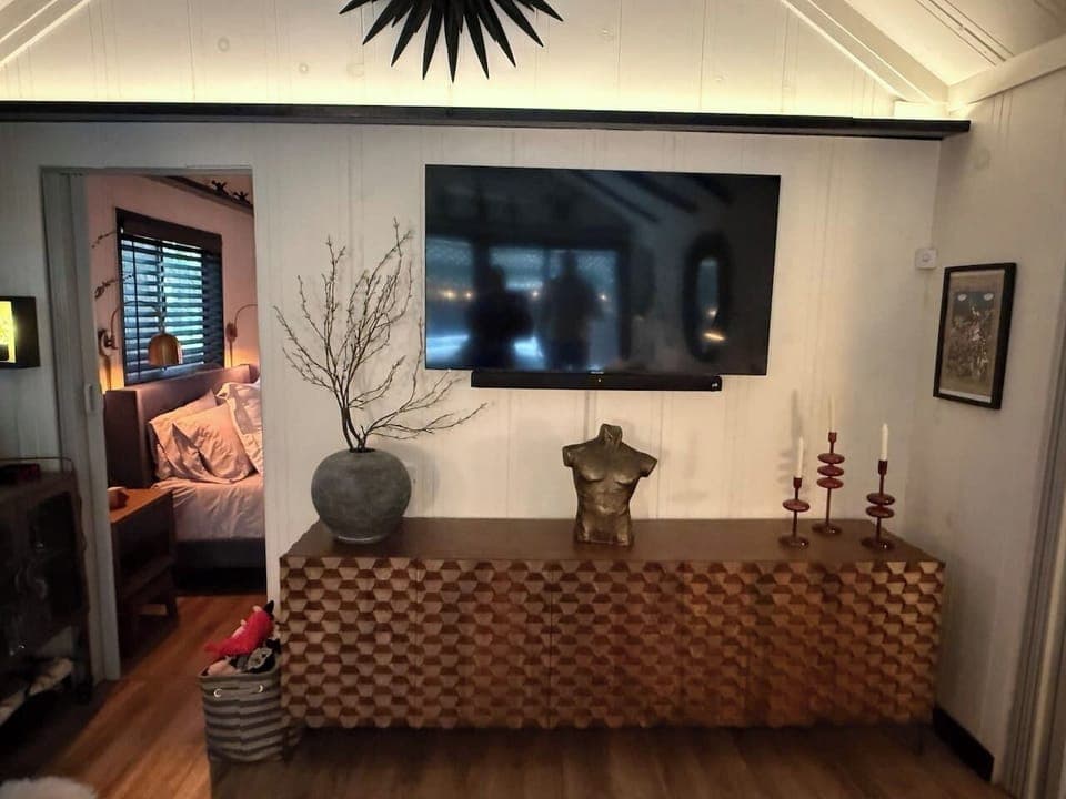 Enjoy your downtime with a 50” TV in the inviting living room.