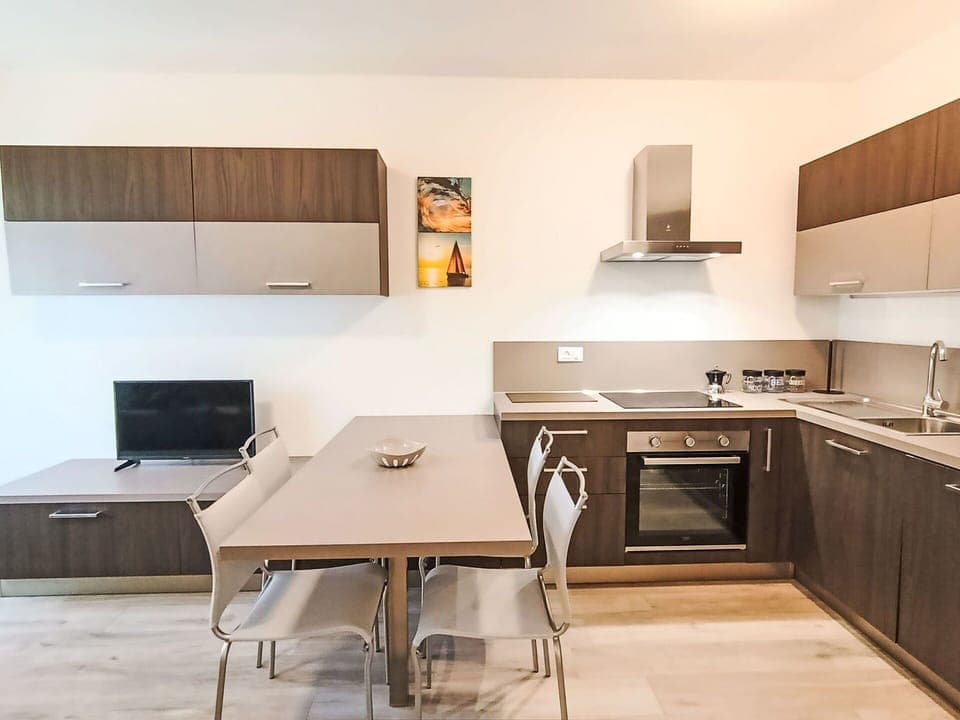 Furniture, Interior Design, Kitchen, Wood, Countertop, Flooring, Cabinetry, Kitchen Appliance, Major Appliance, Room