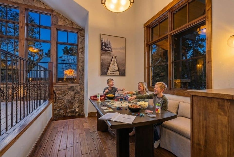 Game Night Spaces -
Multiple cozy areas designed for connection, whether it's cards at the table, a movie on the sofa, or a relaxed evening catch-up.