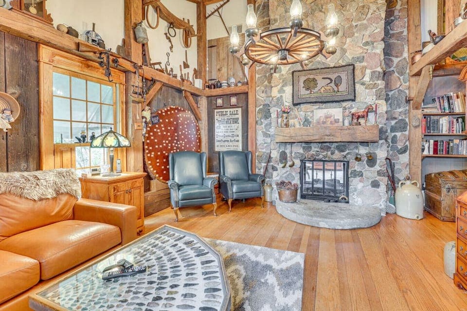 Living Room 1 | Stone Fireplace & Warm Wood Details