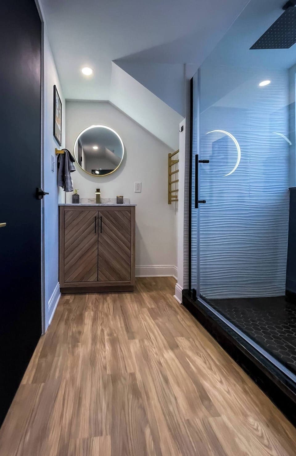 Full bathroom w/ a shower, sink, and a simple, modern layout