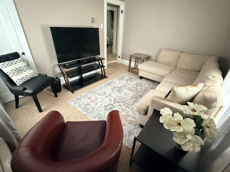 Cozy living room with large flat screen TV