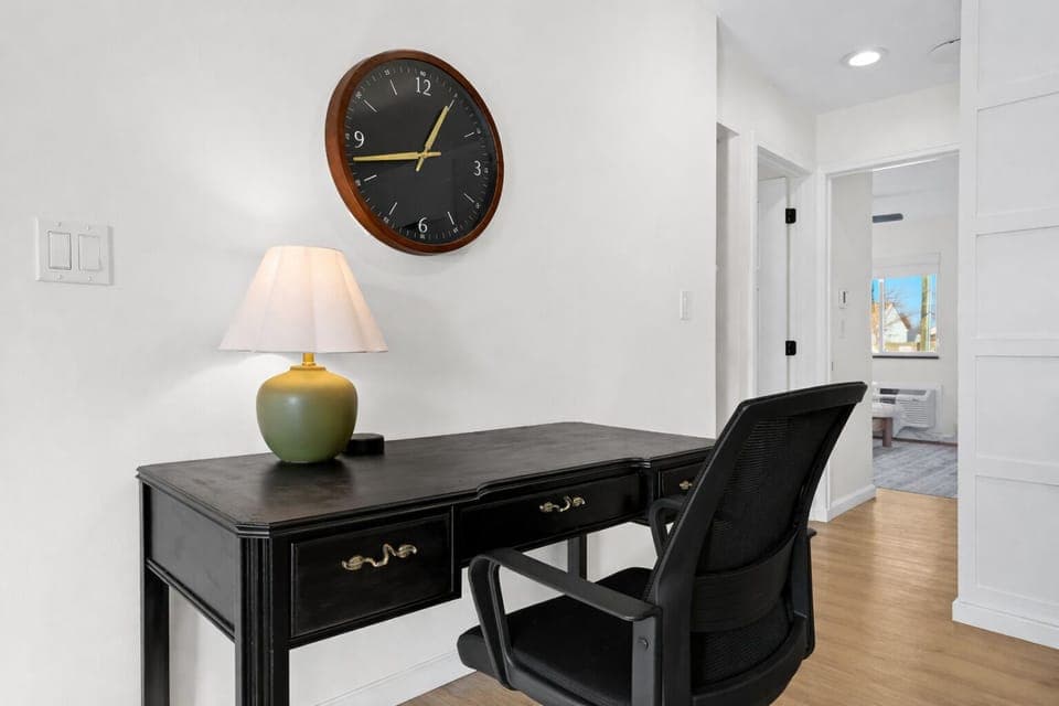 Stay productive at this dedicated workspace featuring a comfortable desk, task lighting, and a quiet setting—ideal for remote work or planning your day.