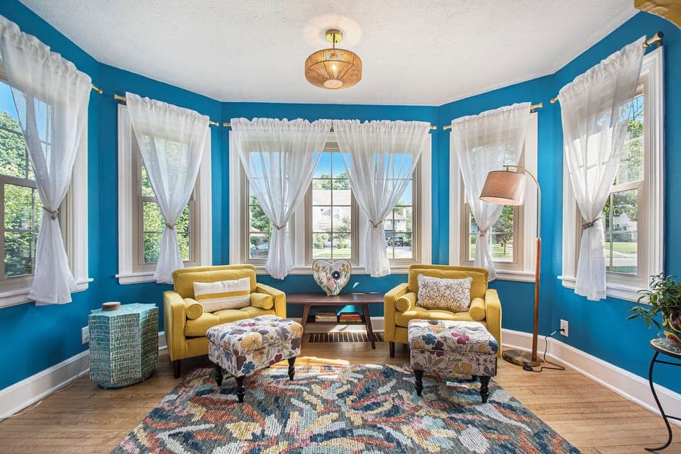 Cozy up with your favorite book in this sunny nook off the living room. 