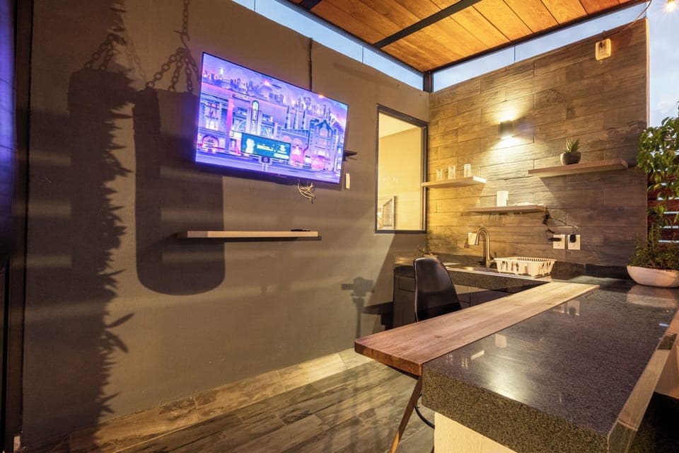 Private terrace, dusk, TV on