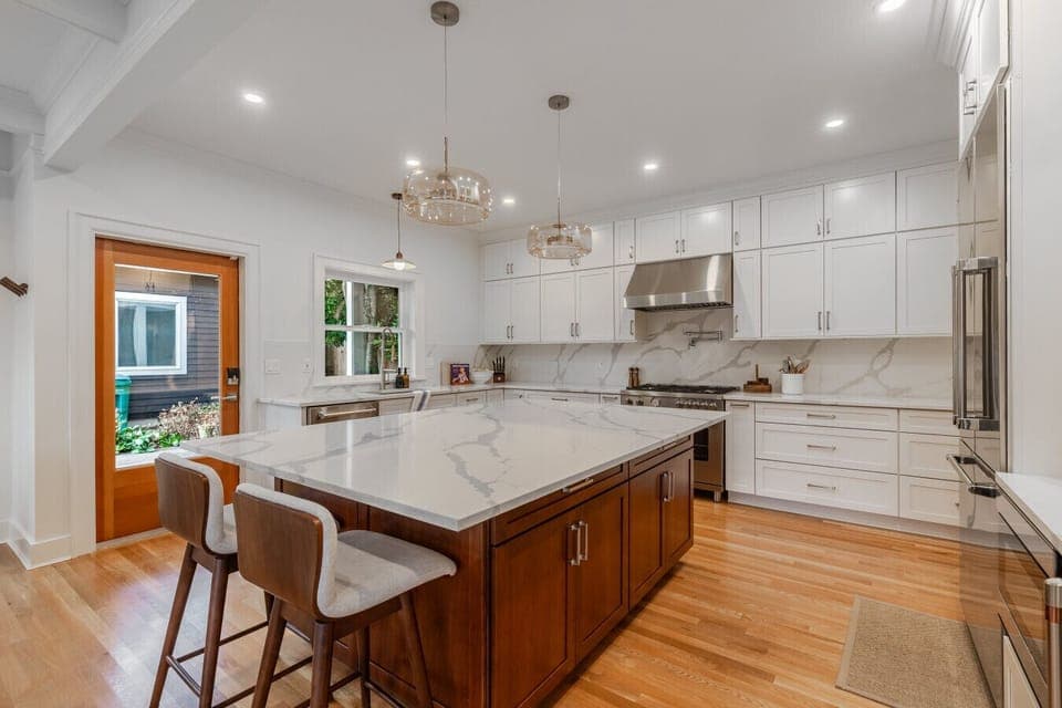 Custom cabinetry and a large island make prep and serving a breeze.