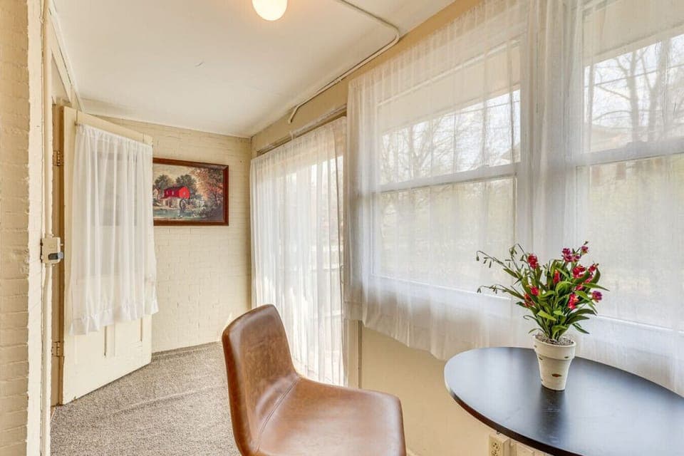 Sunroom Nook | Bistro Seating & Soft Natural Light