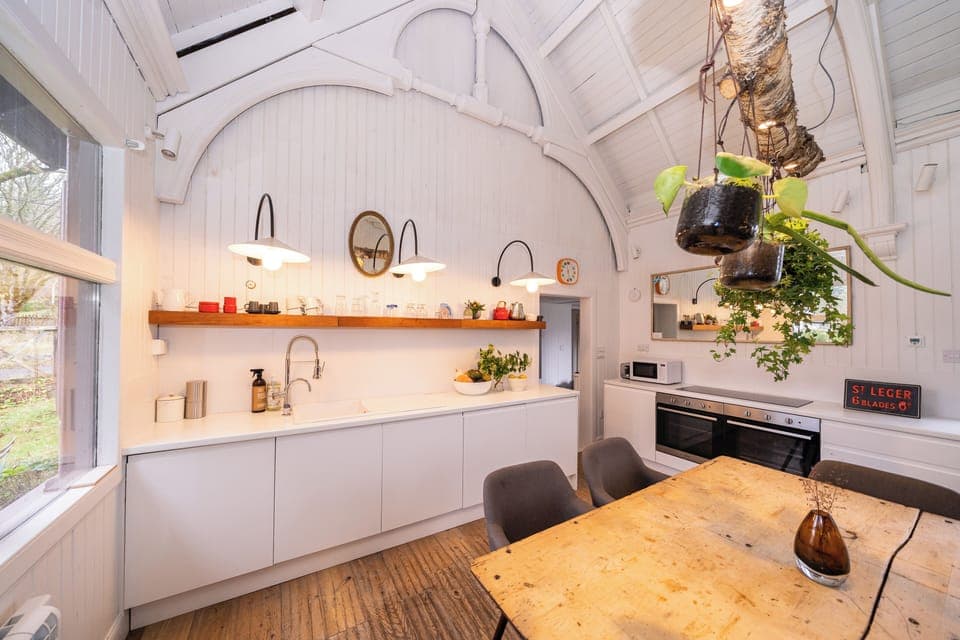 the kitchen we have a new table now which seats 12 