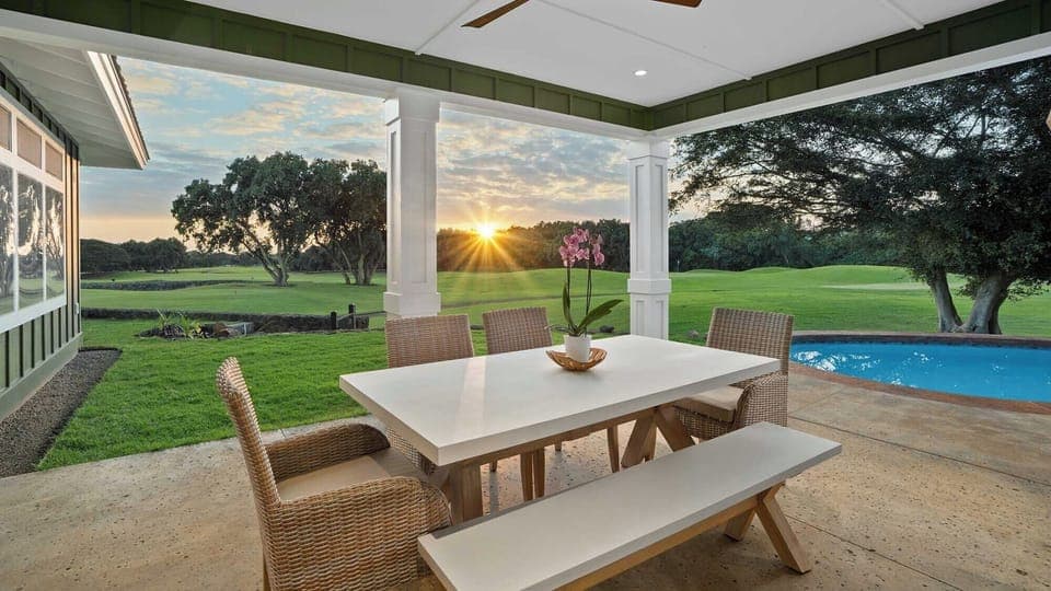 Savor sunset dinners at your private covered dining space, overlooking the golf course with pool views for perfect evenings.