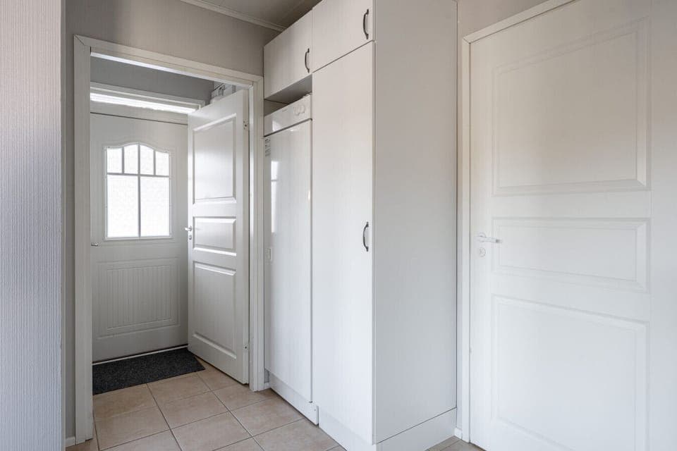 There is plenty of storage for your outdoor gear right by the entrance.