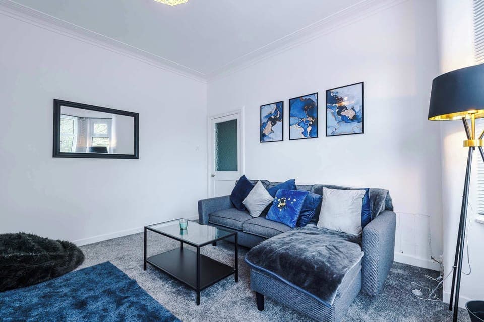 Living Room: Chill out in style with plush decor and vibrant artwork for perfect relaxation!