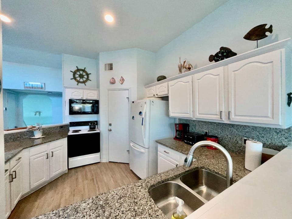 large open kitchen with window views all around