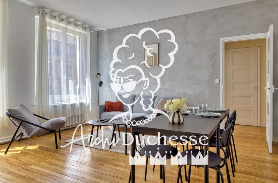 Salle à manger ouverte sur le salon dans un espace moderne et lumineux 