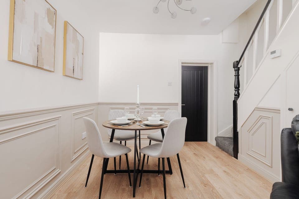 The open-plan living and dining area creates a bright, sociable space perfect for relaxed evenings in. Enjoy home-cooked meals at the dining table, unwind after a day out, or settle in together to watch TV and catch up.