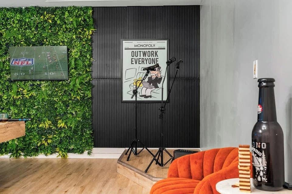 Mini stage corner ready for karaoke nights and group entertainment.