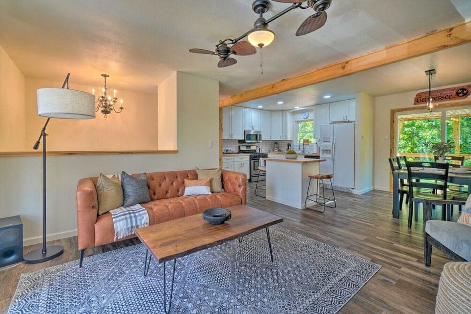 Inviting Living Area | Wall-Mounted TV & Warm Wood Accents
