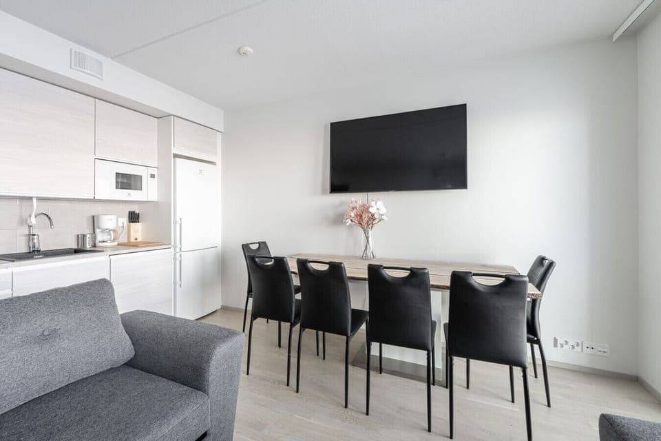 Open-concept living and dining area, perfect for shared meals and relaxing evenings.