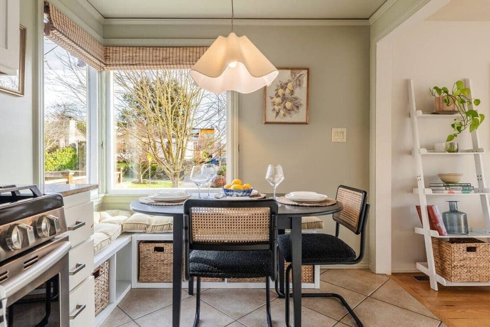 Cute, functional kitchen with everything you need and a cozy spot to dine.