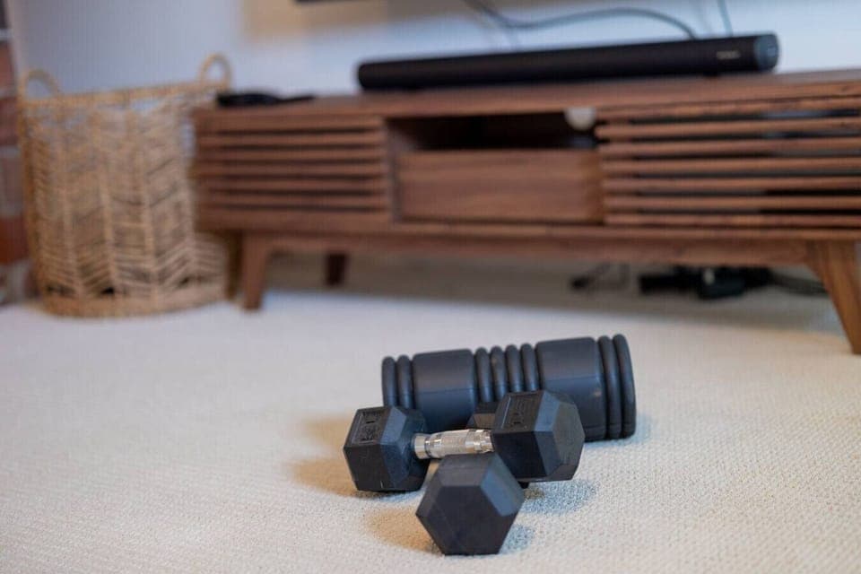 Stay active with dumbbells and foam roller available.