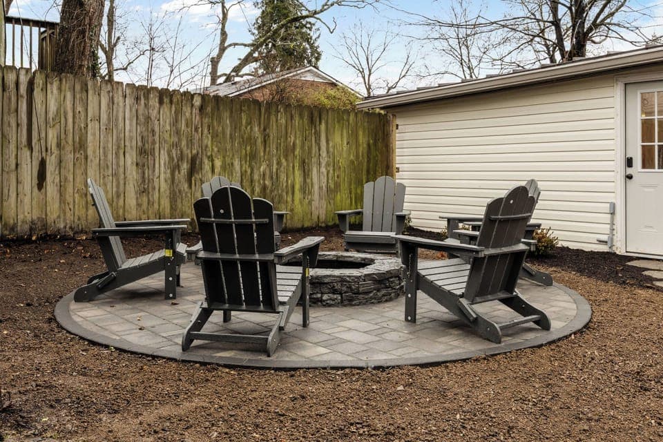 Backyard: After a day of adventures, gather your crew in this private backyard oasis. Soak your cares away in the large, modern hot tub while others relax and chat on the stylish patio seating just steps away. 