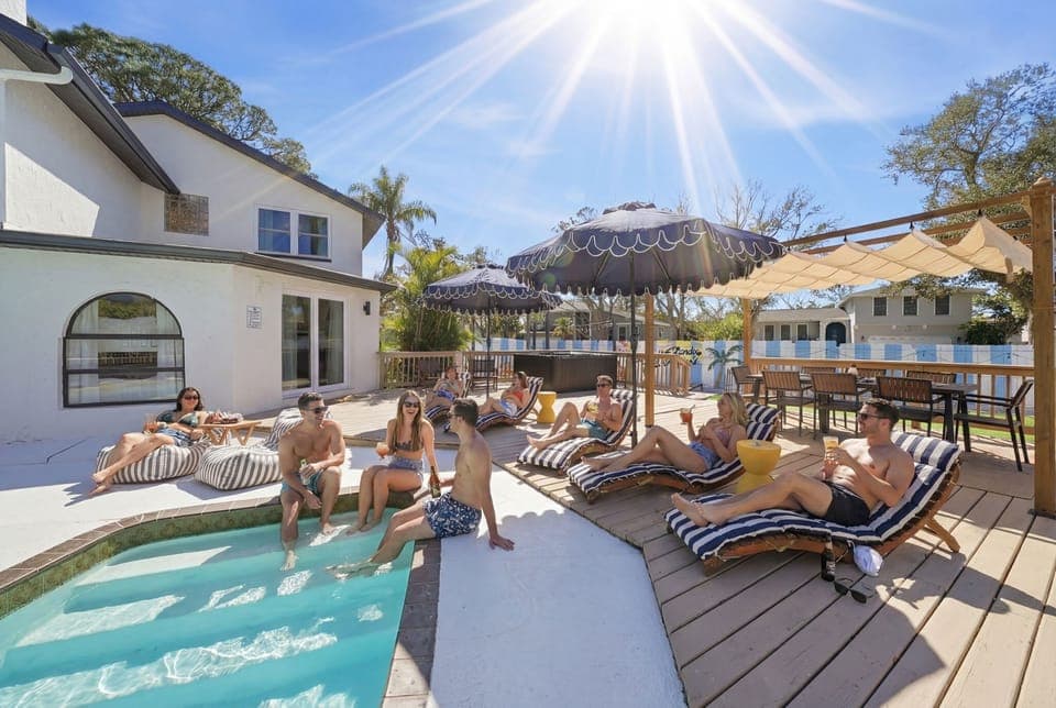 Sun-drenched oasis with a private pool, chic loungers, and the perfect setting for laid-back group getaways