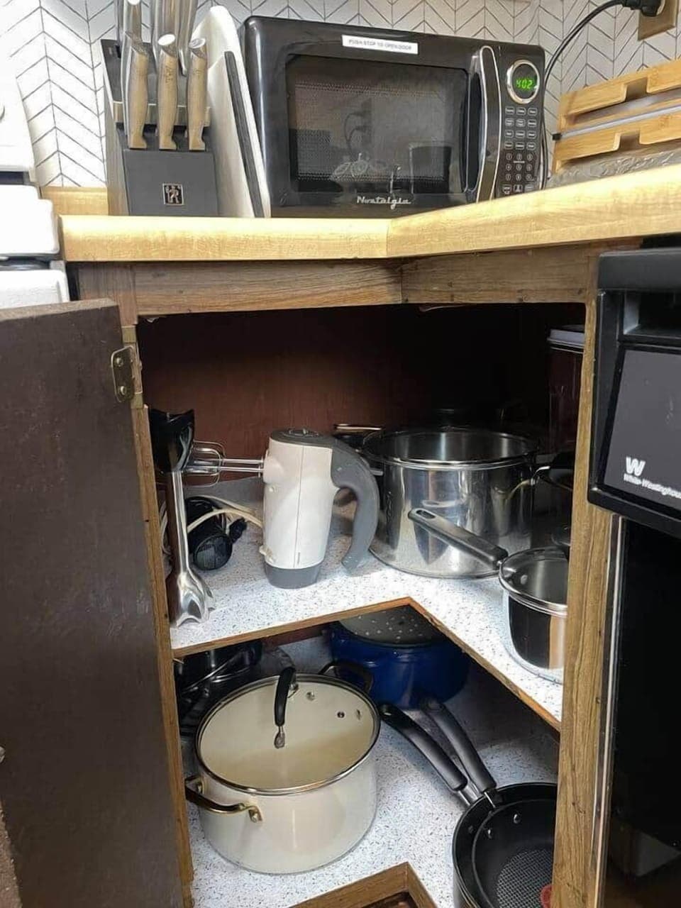 Pots and pans are on hand for your cooking pleasure.