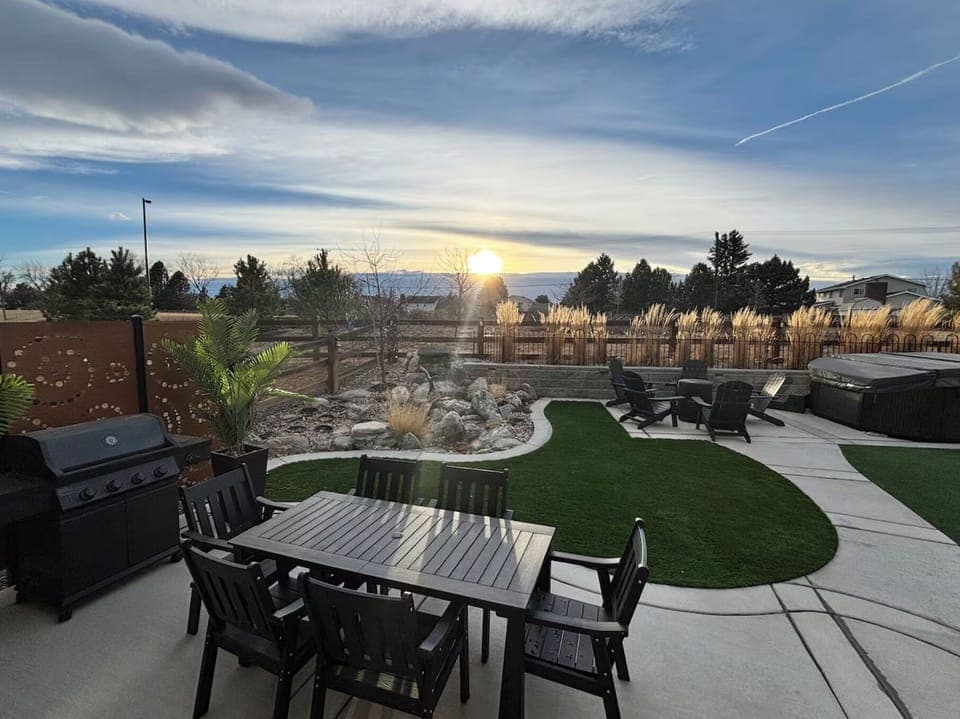 Private backyard with seating and gorgeous sunset views.