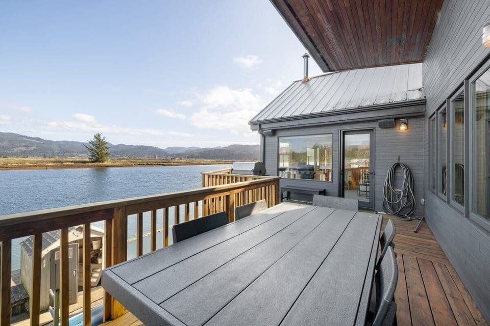 Your private deck offers stunning lake views with outdoor dining space, perfect for morning coffee or sunset meals.