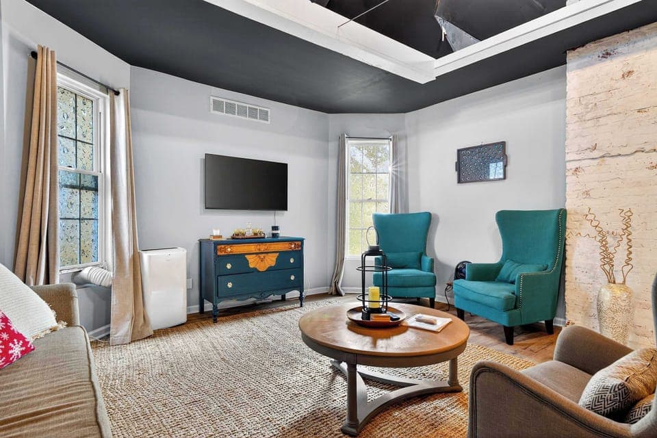 Living Area 2: Enjoy Unit 2’s inviting living area with comfortable furnishings and a relaxing ambiance.