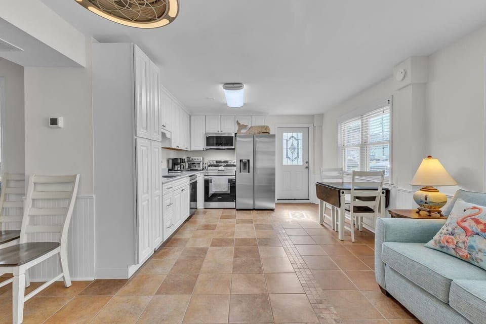 Your bright, open-concept space seamlessly blends kitchen and living areas, perfect for cooking meals and relaxing together.