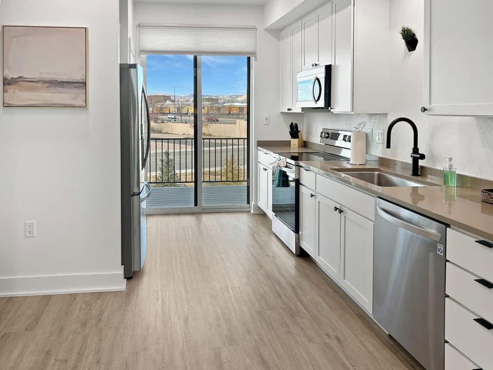Kitchen features stainless steel appliances