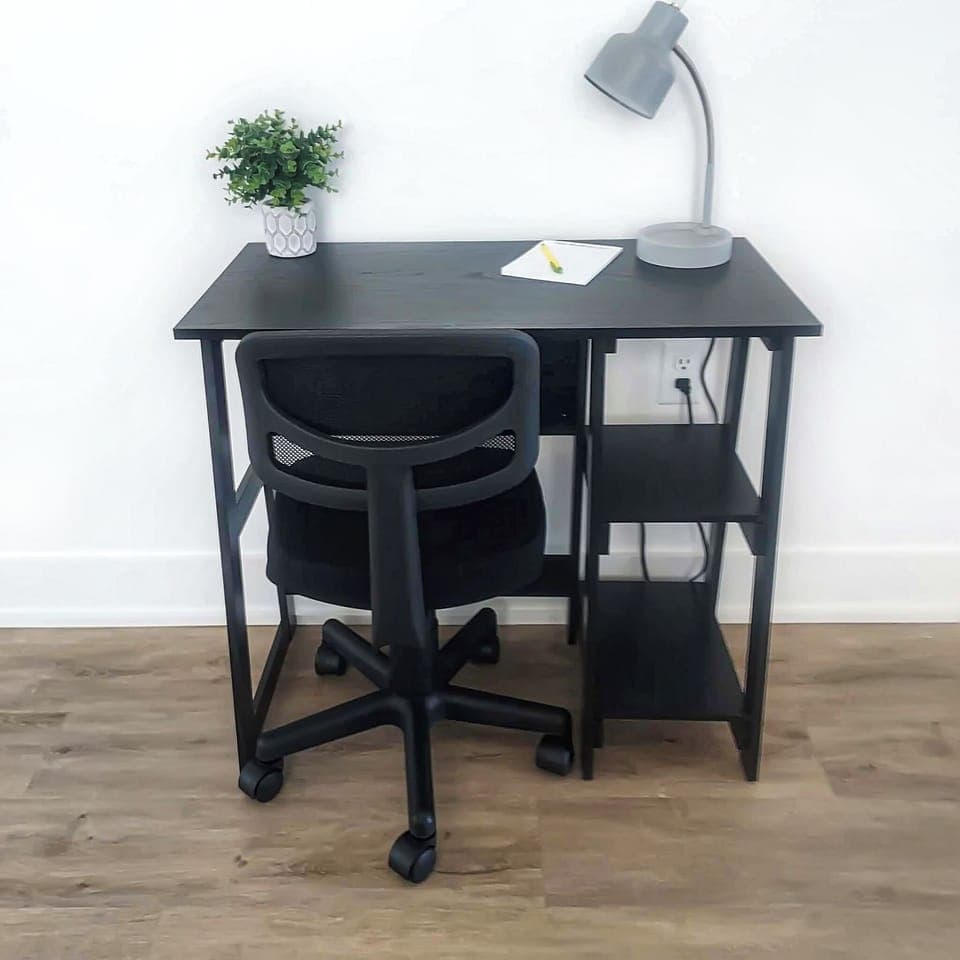 Small desk near dining area.