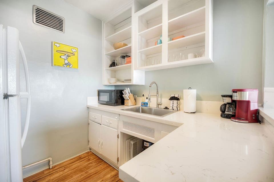 Kitchenette stocked for simple meals and coffee