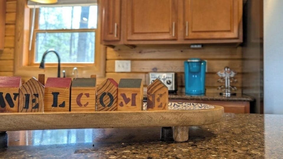 Fully stocked kitchen with stainless appliances & all essentials for your stay.