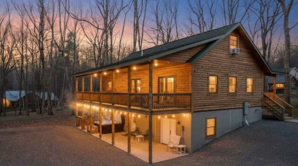 Stunning log home over 3,100 sq ft on 1+ wooded acres. 