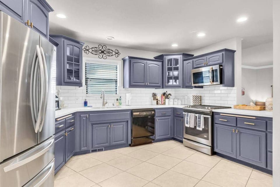 Spacious kitchen layout with everything you need for cooking at home.